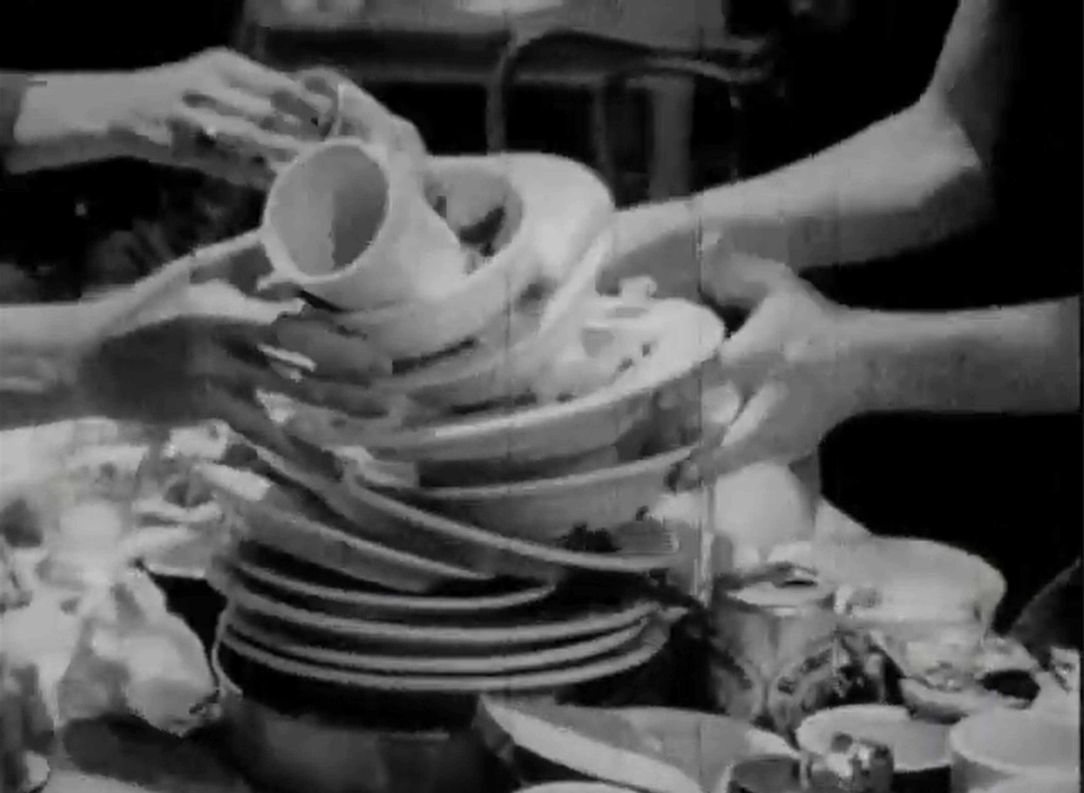 Escena de la recogida de platos. Food, Gordon Matta-Clark, 1972. Arts Intermix; Estate of Gordon Matta-Clark, https://www.youtube.com/watch?v=XxBuoegXxFY